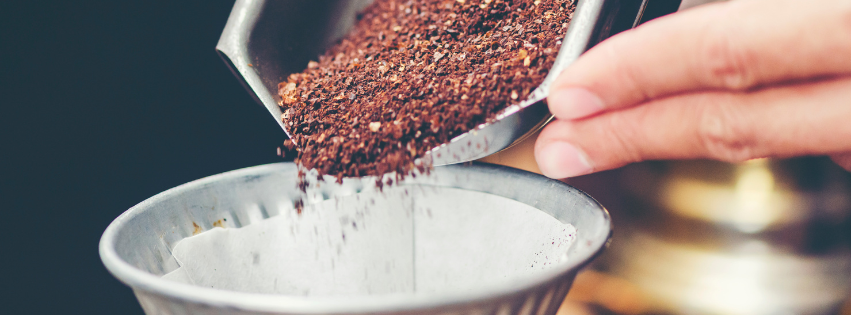 curated box of artisan coffee bags on a kitchen counter, showcasing what is a coffee subscription service for specialty roast lovers