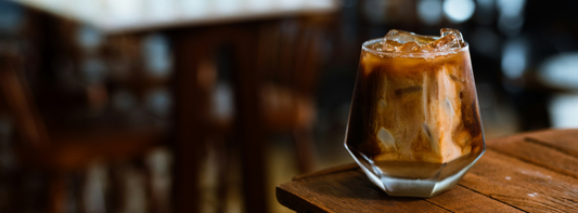 Image of a cold brew coffee in a geometric glass